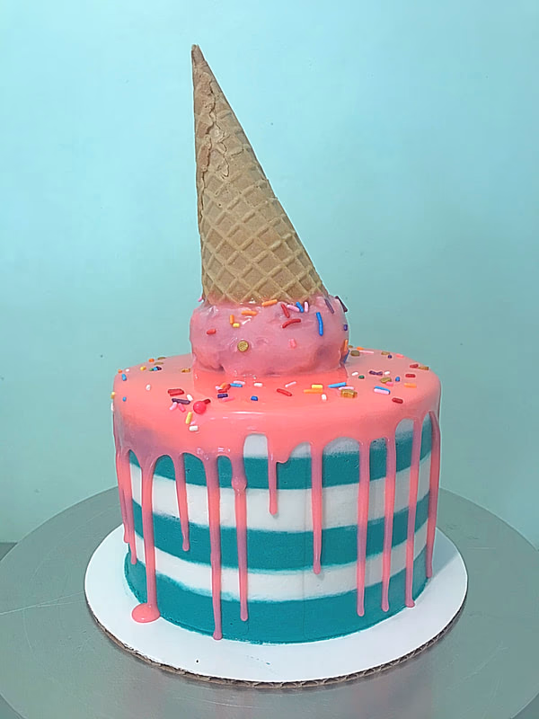 A whimsical cake featuring a melting ice cream cone with a humorous 'sad' expression.