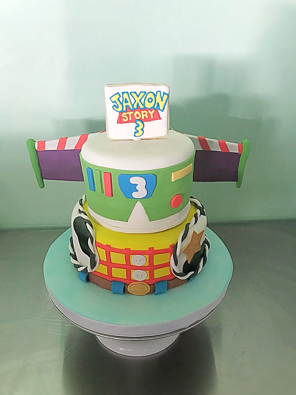 A Buzz Lightyear themed cake, featuring the iconic space ranger from Toy Story.
